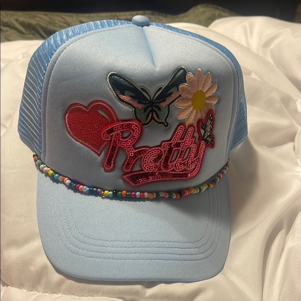 Blue Trucker Hat with Embroidered Patches